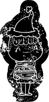 cartoon distressed icon of a friendly boy with books wearing santa hat vector