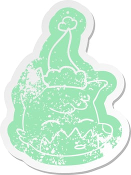 cartoon distressed sticker of a fox face wearing santa hat vector