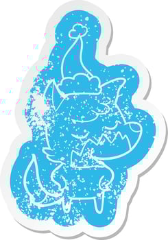 friendly cartoon distressed sticker of a fox wearing santa hat vector
