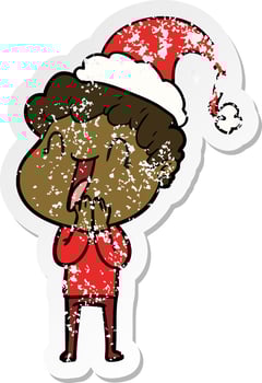 distressed sticker cartoon of a happy man wearing santa hat vector