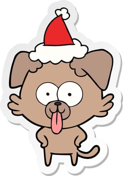 sticker cartoon of a dog with tongue sticking out wearing santa hat vector
