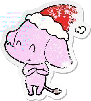 cute distressed sticker cartoon of a elephant wearing santa hat vector