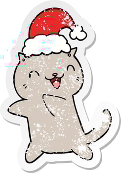 distressed sticker of a cute cartoon christmas cat vector