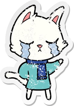 distressed sticker of a crying cartoon cat wearing winter clothes vector