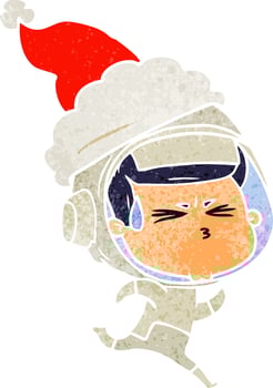 retro cartoon of a stressed astronaut wearing santa hat vector