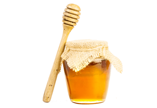Glass jar full of honey wooden honey dipper on isolated background png