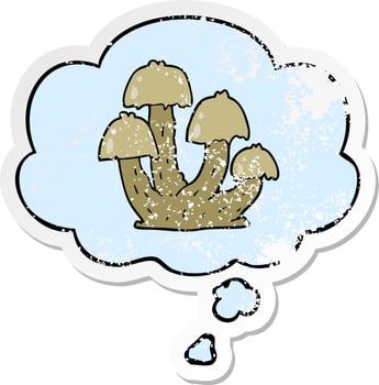 cartoon mushrooms and thought bubble as a distressed worn sticker vector