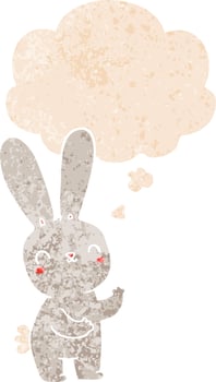 cute cartoon rabbit and thought bubble in retro textured style vector