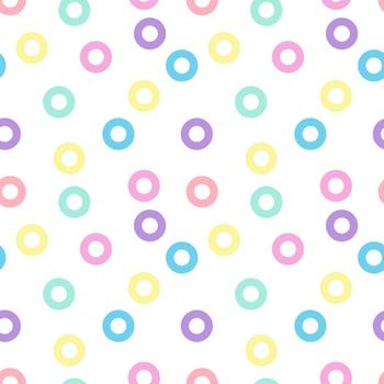 Seamless background with small donut circles pattern in pastel tones vector