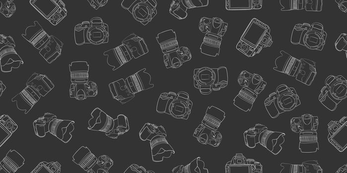 Hand drawn photo camera seamless pattern Grey technology background vector