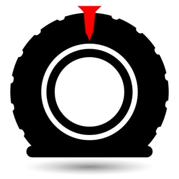 Punctured tyre vector icon isolated on a white background.