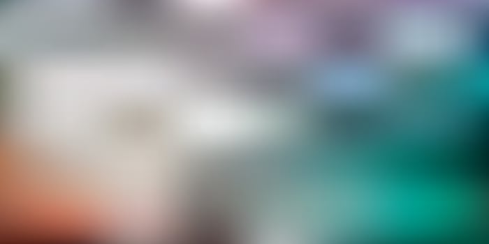 Light green, red vector gradient blur backdrop.