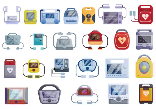 Defibrillator icons set, cartoon style vector