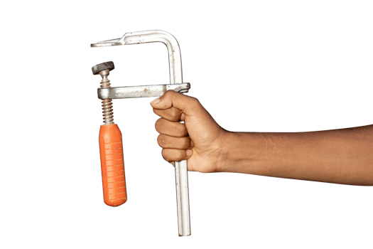Clamp tool in male hand isolated on white png
