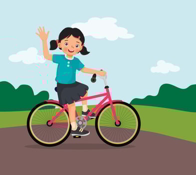 happy little girl riding a bike having fun in the park on sunny day waving hand vector