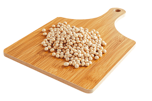 Several soybeans on a wooden cutting board on a white background with a clipping path. png