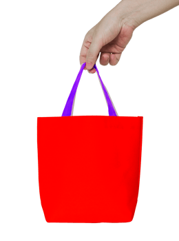 hand holding red fabric bag isolated with clipping path for mockup png