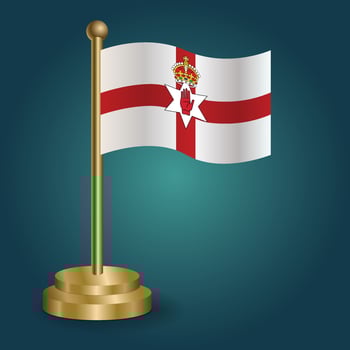Northern Ireland national flag on golden pole on gradation isolated dark background. table flag, vector illustration