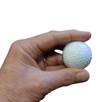many white and orange golf balls in a box png