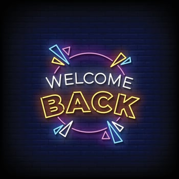 Neon Sign welcome back with brick wall background vector