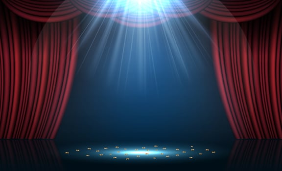 Red stage curtain illuminated by spotlights. Vector illustration