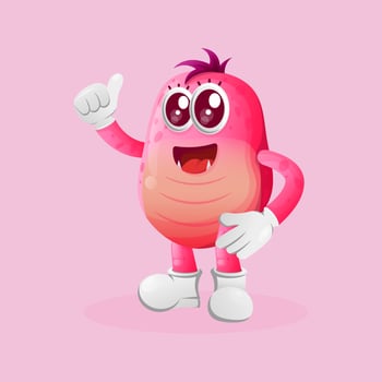 Cute pink monster thumbs up vector