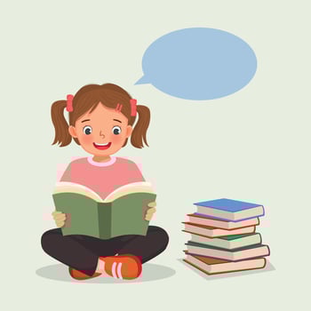 Cute little girl reading a book sitting on the floor beside stack of books vector
