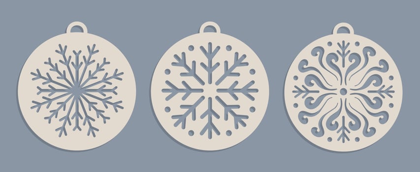 Set of Laser cut Christmas baubles Templates. Christmas tree wood decorations balls with snowflakes vector