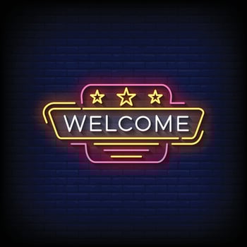 neon sign welcome with brick wall background vector illustration