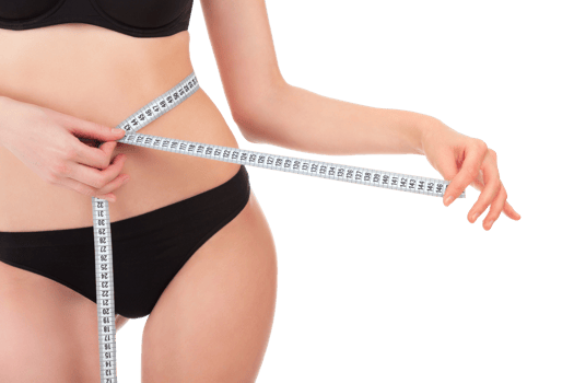 Slender woman measuring her waist with metric tape measure after a diet, isolated png