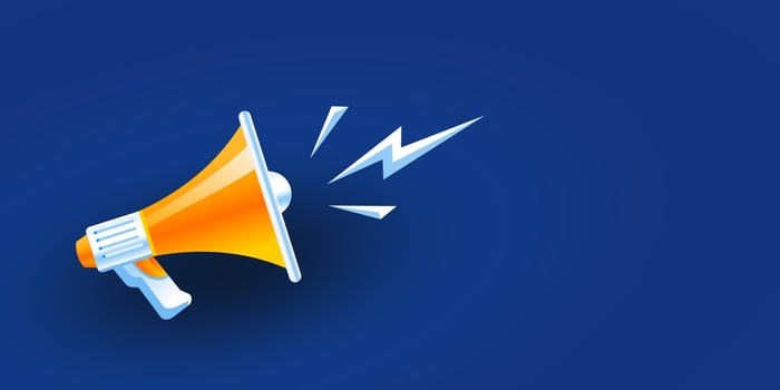 orange and yellow realistic 3d megaphone vector illustration on blue background, loudspeaker concept of join us, job vacancy and announcement in modern flat cartoon style design
