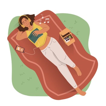 Girl listening to music while laying down in the park vector
