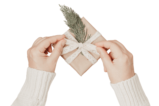 Beige gift box and woman hands isolated on a transparent background png
