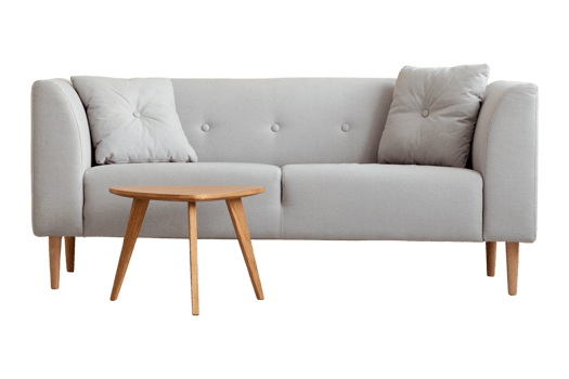 Gray sofa, cushions and wooden side table isolated on a transparent background png