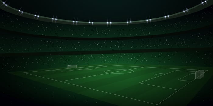 3d realistic soccer stadium at night. vector