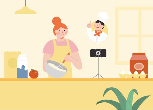 Young woman is standing in the kitchen and watching baking tutorials or learning from online cooking classes. vector