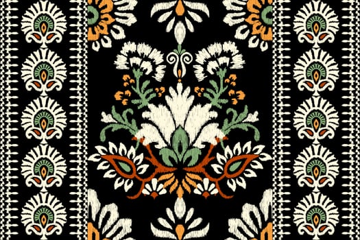 Ikat floral paisley embroidery on black background.Ikat ethnic oriental pattern traditional.Aztec style abstract vector illustration.design for texture,fabric,clothing,wrapping,decoration,scarf,carpet