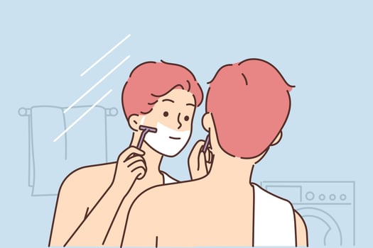 Man shaves face standing in bathroom and looking in mirror doing daily morning hygiene routine. Guy with naked torso and towel on shoulder stands with back to camera and shaves face going to work vector