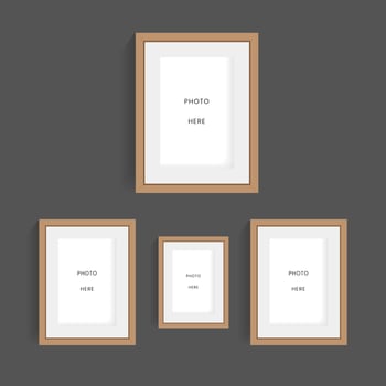 Set of four wooden frames of pictures on the dark wall mock up designs, modern groups of picture frames vector designs on the wall  mock up vector illustration