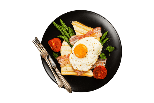Fried egg with bread toast and asparagus on transparent background png
