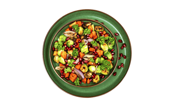 Fresh grilled vegetable salad with pomegranate seeds on transparent background png