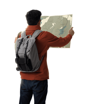 A young traveler man with backpack in look searching direction on location map transparent background png, Adventure and travel in the mountains region concept png