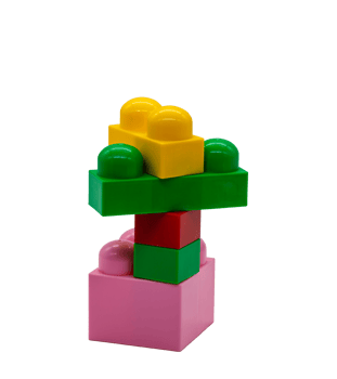 Children's toy constructor lego different sizes. Red, pink and yellow and green blocks with no background. Photo in high quality. PNG
