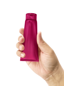 Hand holding Cosmetic plastic tube, transparent background png
