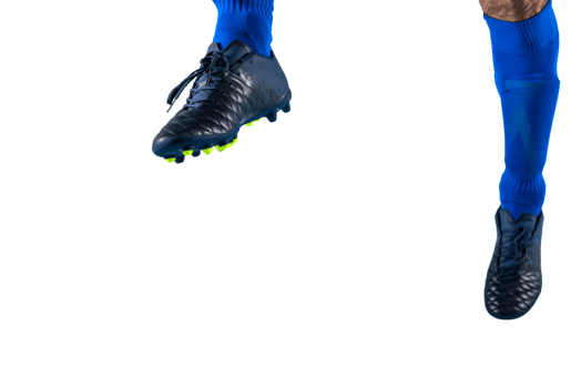 Isolated football  player plays with soccerball in a match png