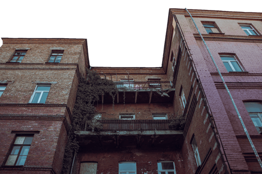 Old city architecture backyard with large balcony, Kharkiv. Cityscape photo in Ukraine. png