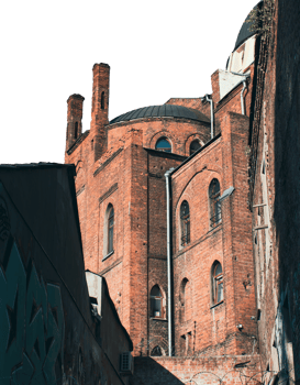 Exterior of a beautiful old building on a street in city, back side photo. png