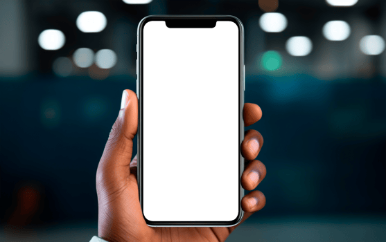 Hand holding smartphone with blank transparent screen on blurry city background at night. Mockup template for artwork design. png