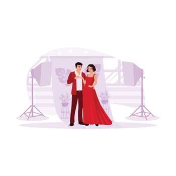 Portrait of a young couple, excited to do a photoshoot. In a studio complete with beautiful flower backgrounds and shining lights. Trend modern vector flat illustration.