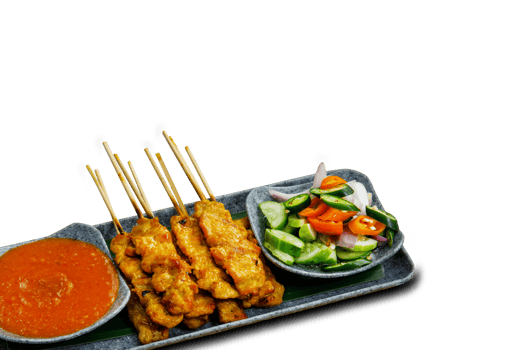 Pork Satay on plate. Grilled pork served with peanut dipping sauce,toasted bread and sweet sour sauce decorated with cucumber,onion and chili. One of the best Thai street food. png